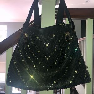 Black and gold studded leather purse